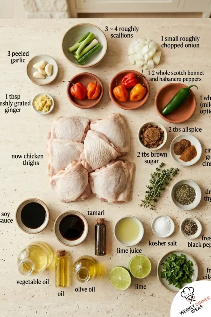 Jerk Chicken Thighs Ingredients Ingredients for Jerk Chicken Thighs including chicken thighs, scallions, garlic, thyme, allspice, peppers, lime, and soy sauce